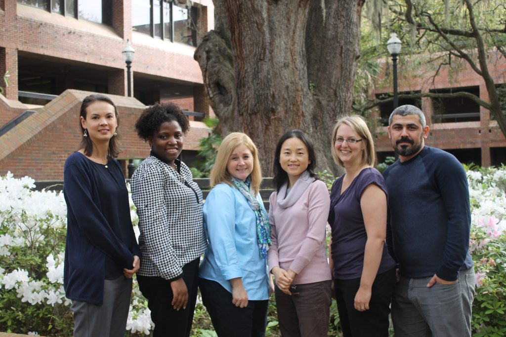 Helena Mawdsley and others in the Norman Hall Courtyard